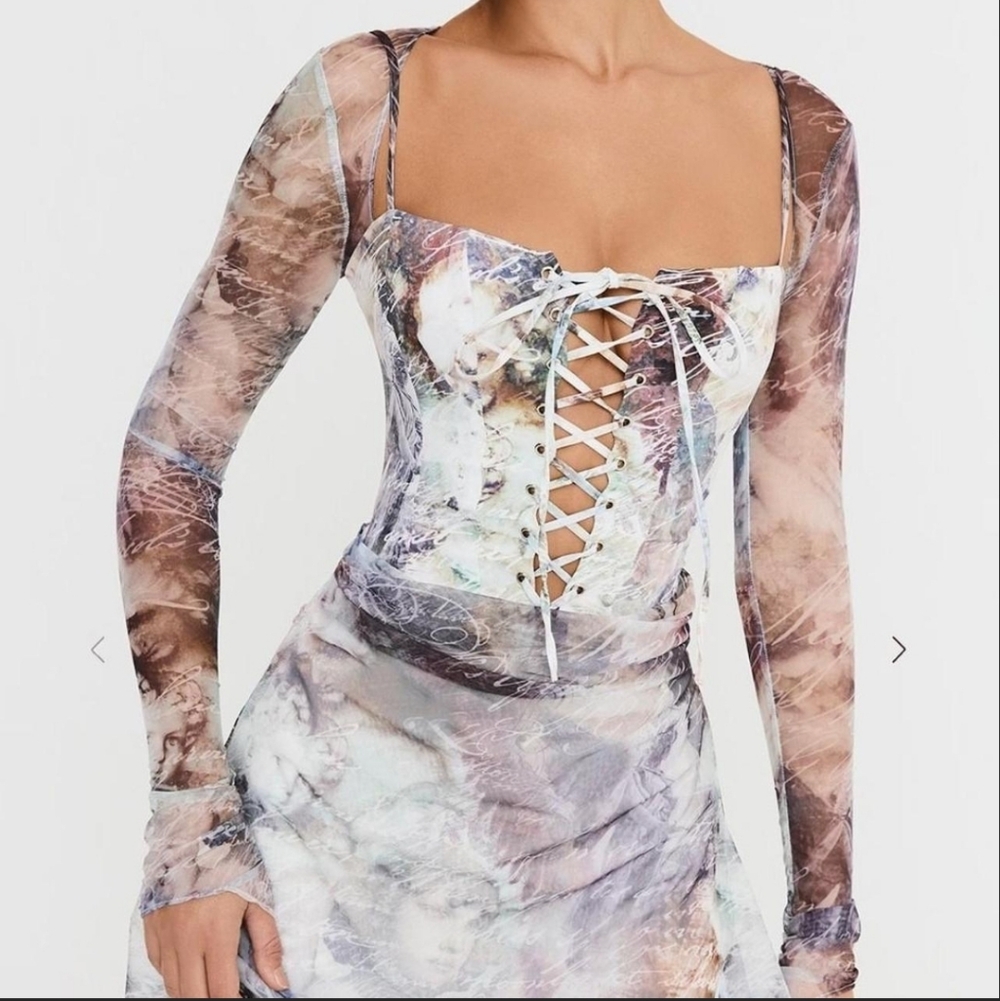 Mistress rocks Printed lace up dress.